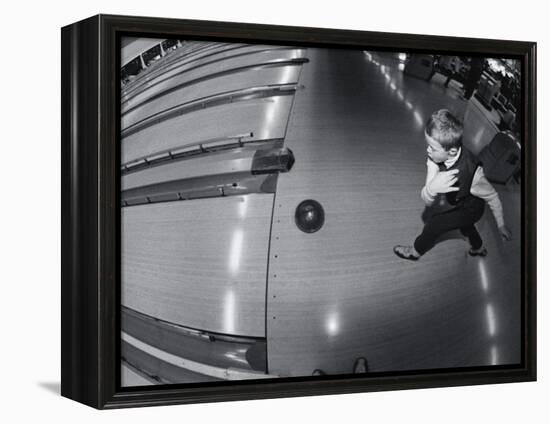 High Angle View of a Boy Bowling-null-Framed Premier Image Canvas