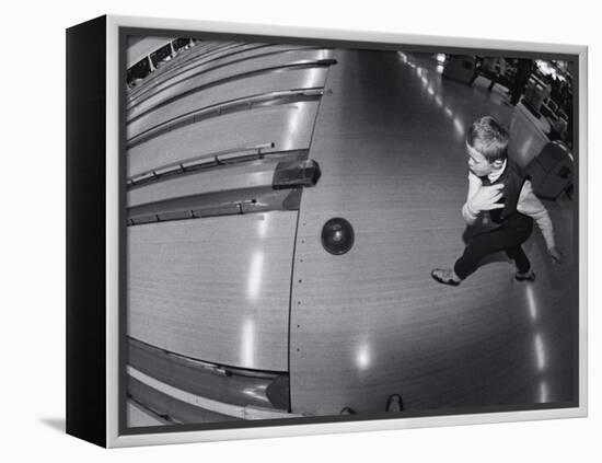 High Angle View of a Boy Bowling-null-Framed Premier Image Canvas