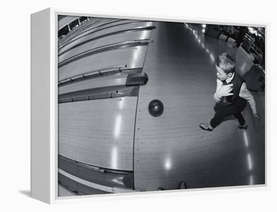 High Angle View of a Boy Bowling-null-Framed Premier Image Canvas