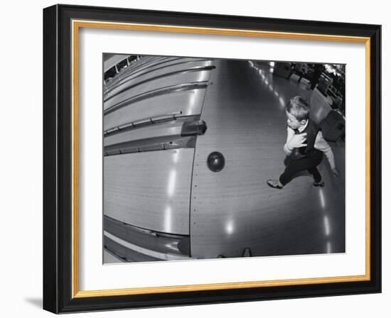 High Angle View of a Boy Bowling-null-Framed Photographic Print