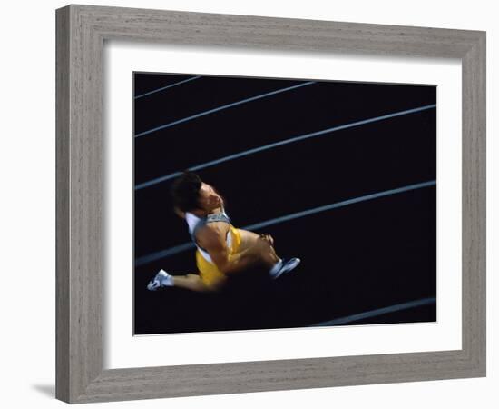 High Angle View of a Young Man Running on a Running Track-null-Framed Photographic Print