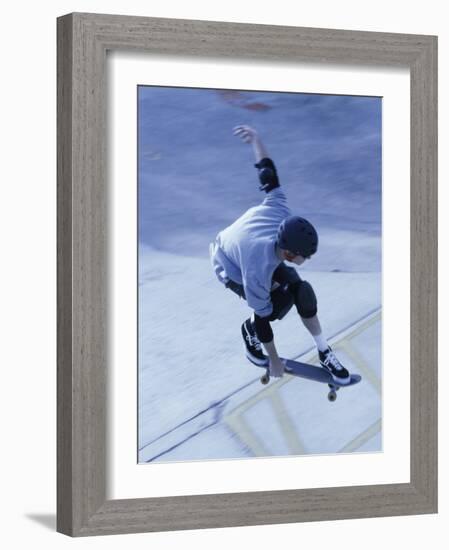 High Angle View of a Young Man Skateboarding-null-Framed Photographic Print