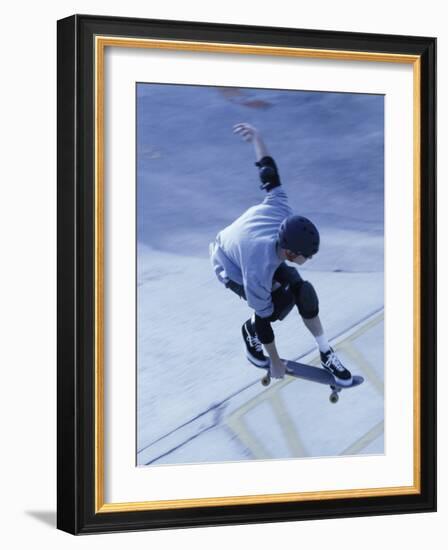 High Angle View of a Young Man Skateboarding-null-Framed Photographic Print