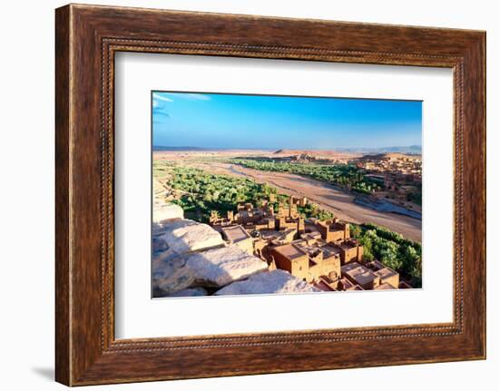 High angle view of Ait Ben Haddou, in the desert landscape at feet of Atlas Mountains-Roberto Moiola-Framed Photographic Print