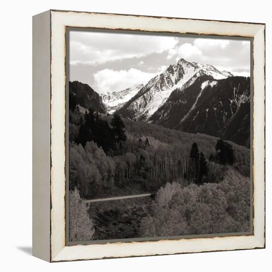 High angle view of road winding up the side of a hill with mountains in the distance-null-Framed Premier Image Canvas