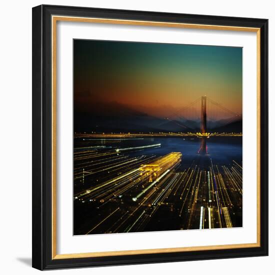 High Angle View Of San Francisco And The Golden Gate Bridge At Sunset With Streaks Of Light-Ron Koeberer-Framed Photographic Print