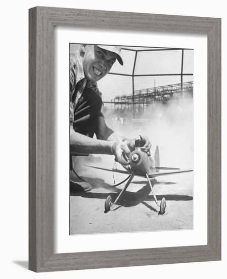 High School Student Holding His Model Plane Before Takeoff-Ed Clark-Framed Photographic Print