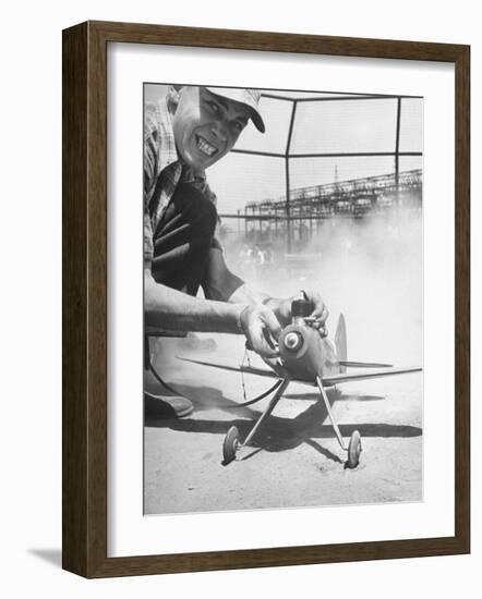 High School Student Holding His Model Plane Before Takeoff-Ed Clark-Framed Photographic Print