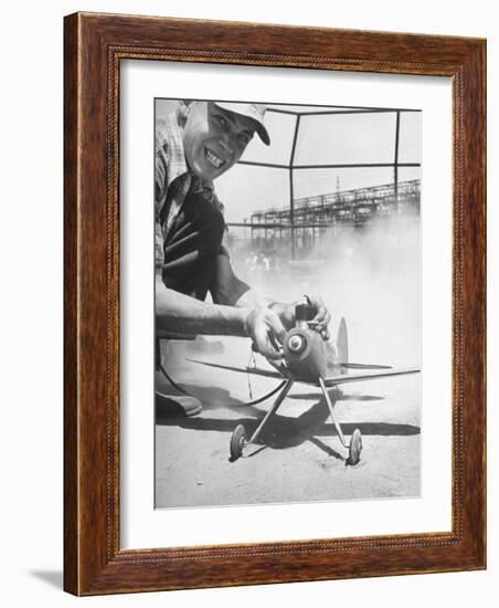High School Student Holding His Model Plane Before Takeoff-Ed Clark-Framed Photographic Print