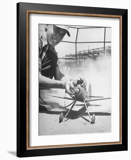 High School Student Holding His Model Plane Before Takeoff-Ed Clark-Framed Photographic Print