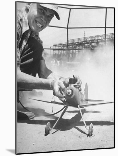 High School Student Holding His Model Plane Before Takeoff-Ed Clark-Mounted Photographic Print