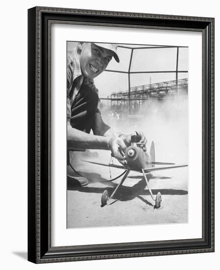 High School Student Holding His Model Plane Before Takeoff-Ed Clark-Framed Photographic Print