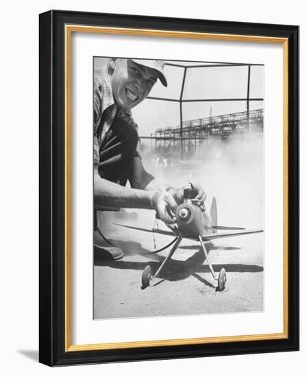 High School Student Holding His Model Plane Before Takeoff-Ed Clark-Framed Photographic Print