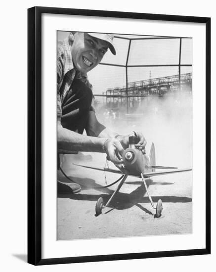 High School Student Holding His Model Plane Before Takeoff-Ed Clark-Framed Photographic Print