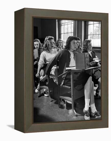 High School Student Passing Note to Classmate Sitting Behind Her-Nina Leen-Framed Premier Image Canvas