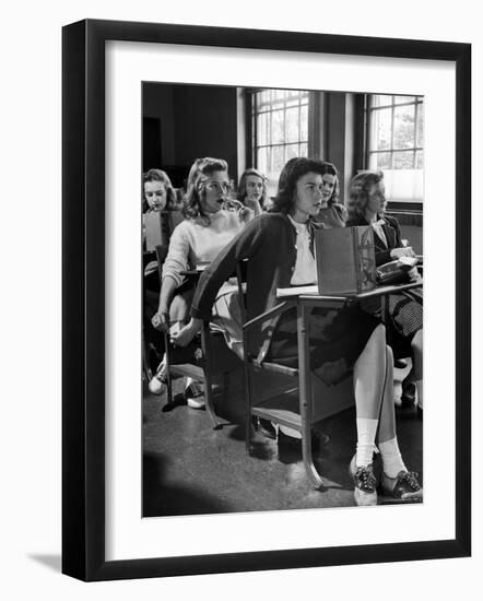 High School Student Passing Note to Classmate Sitting Behind Her-Nina Leen-Framed Photographic Print