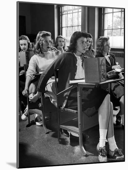 High School Student Passing Note to Classmate Sitting Behind Her-Nina Leen-Mounted Photographic Print