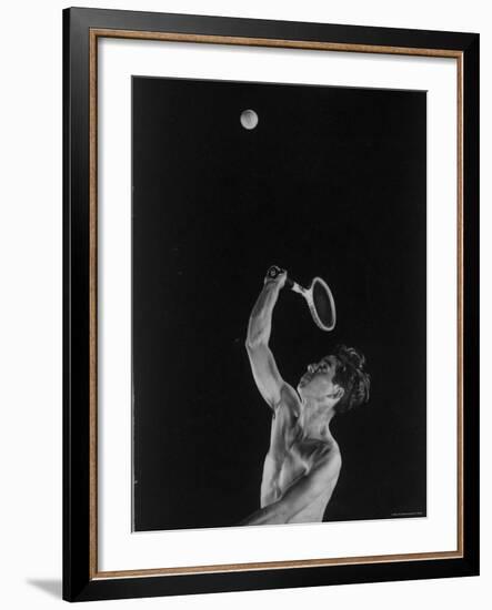 High Speed Photograph of Tennis Pro Bobby Riggs Serving a Ball-Gjon Mili-Framed Premium Photographic Print