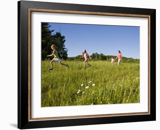 Hikeers walk in a field in Sabins Pasture, Montpelier, Vermont, USA-Jerry & Marcy Monkman-Framed Photographic Print