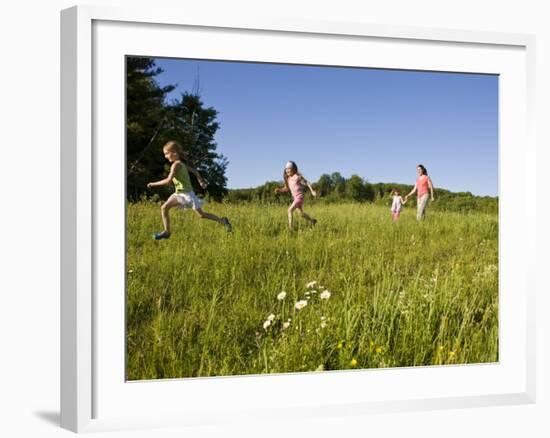 Hikeers walk in a field in Sabins Pasture, Montpelier, Vermont, USA-Jerry & Marcy Monkman-Framed Photographic Print