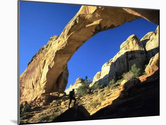Hiker Below Natural Navajo Sandstone Hickman Bridge, Capitol Reef National Park, Utah, Usa-Scott T. Smith-Mounted Photographic Print