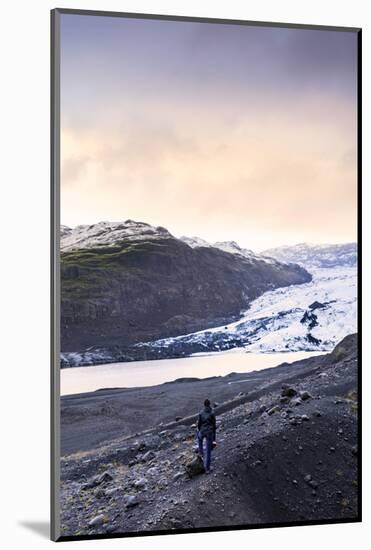 Hiker in front of the Vatnajokull glacier in Vatnajokull National Park in southeast Iceland, Polar -Alex Robinson-Mounted Photographic Print