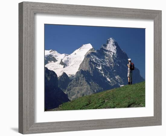 Hiker Looking to the Snow-Covered Monch and the North Face of the Eiger, Swiss Alps, Switzerland-Ruth Tomlinson-Framed Photographic Print