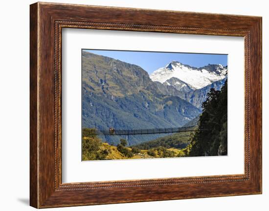 Hikers Cross a Footbridge, Rob Roy Glacier Trail, New Zealand-James White-Framed Photographic Print