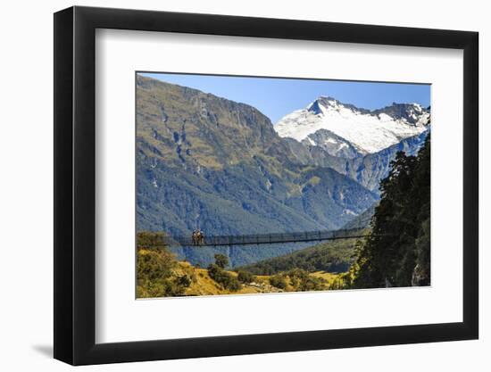 Hikers Cross a Footbridge, Rob Roy Glacier Trail, New Zealand-James White-Framed Photographic Print