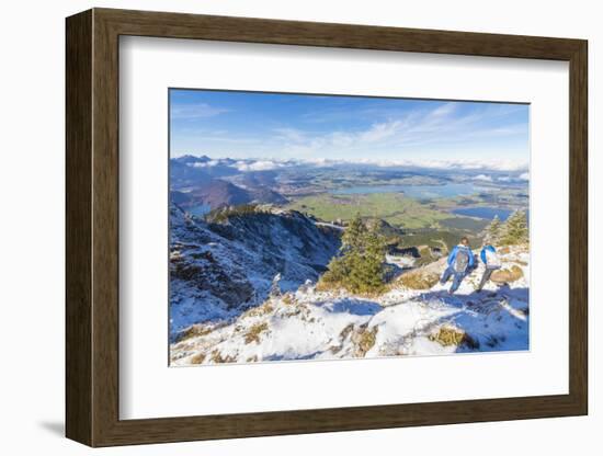 Hikers on steep crest covered with snow in the Ammergau Alps, Tegelberg, Fussen, Bavaria, Germany, -Roberto Moiola-Framed Photographic Print