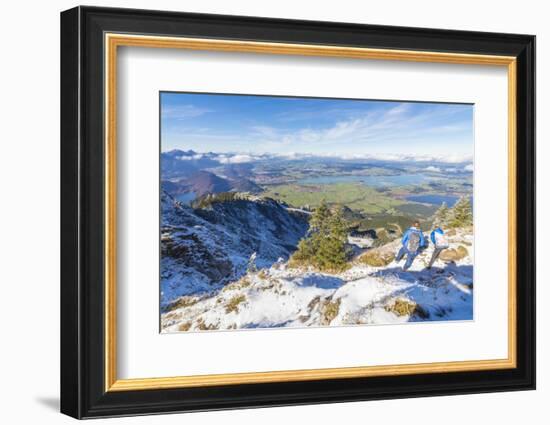 Hikers on steep crest covered with snow in the Ammergau Alps, Tegelberg, Fussen, Bavaria, Germany, -Roberto Moiola-Framed Photographic Print