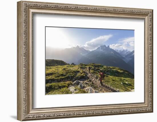 Hikers on the way to Lacs De Cheserys from Argentiere with Les Drus and Aiguille Verte in the backg-Roberto Moiola-Framed Photographic Print