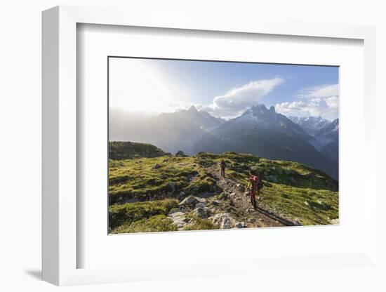 Hikers on the way to Lacs De Cheserys from Argentiere with Les Drus and Aiguille Verte in the backg-Roberto Moiola-Framed Photographic Print