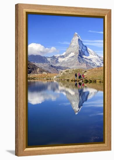 Hikers Walking on the Path Beside the Stellisee with the Matterhorn Reflected-Roberto Moiola-Framed Premier Image Canvas