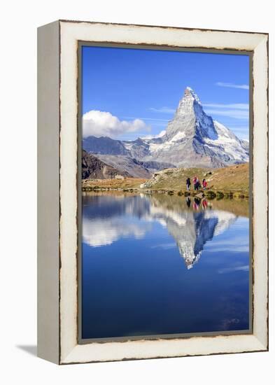 Hikers Walking on the Path Beside the Stellisee with the Matterhorn Reflected-Roberto Moiola-Framed Premier Image Canvas