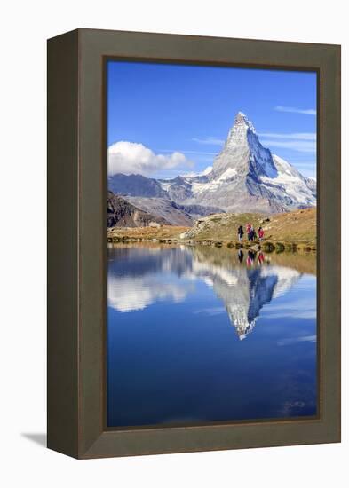 Hikers Walking on the Path Beside the Stellisee with the Matterhorn Reflected-Roberto Moiola-Framed Premier Image Canvas