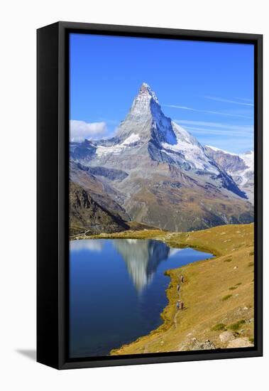 Hikers Walking on the Path Beside the Stellisee with the Matterhorn Reflected-Roberto Moiola-Framed Premier Image Canvas