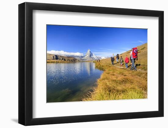 Hikers Walking on the Path Beside the Stellisee with the Matterhorn Reflected-Roberto Moiola-Framed Photographic Print