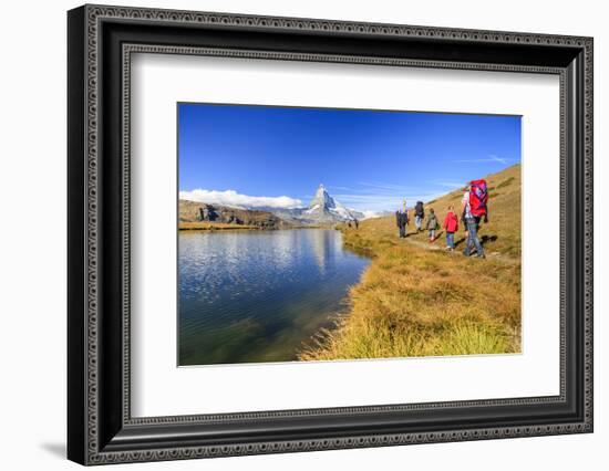 Hikers Walking on the Path Beside the Stellisee with the Matterhorn Reflected-Roberto Moiola-Framed Photographic Print