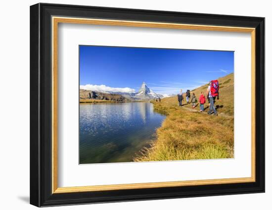 Hikers Walking on the Path Beside the Stellisee with the Matterhorn Reflected-Roberto Moiola-Framed Photographic Print