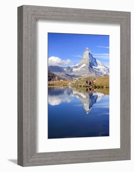 Hikers Walking on the Path Beside the Stellisee with the Matterhorn Reflected-Roberto Moiola-Framed Photographic Print