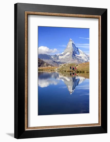 Hikers Walking on the Path Beside the Stellisee with the Matterhorn Reflected-Roberto Moiola-Framed Photographic Print