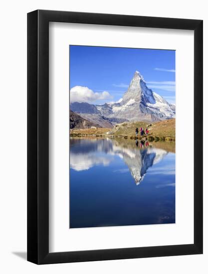 Hikers Walking on the Path Beside the Stellisee with the Matterhorn Reflected-Roberto Moiola-Framed Photographic Print