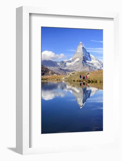 Hikers Walking on the Path Beside the Stellisee with the Matterhorn Reflected-Roberto Moiola-Framed Photographic Print