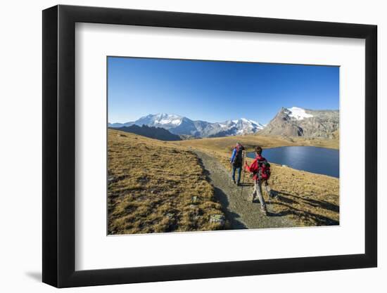 Hikers Wallking Along Rosset Lake, Gran Paradiso National Park, Alpi Graie (Graian Alps), Italy-Roberto Moiola-Framed Photographic Print