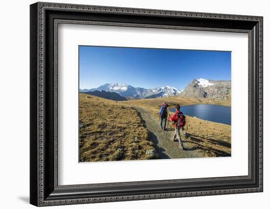 Hikers Wallking Along Rosset Lake, Gran Paradiso National Park, Alpi Graie (Graian Alps), Italy-Roberto Moiola-Framed Photographic Print