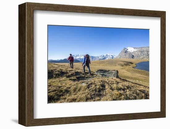 Hikers Wallking Along Rosset Lake, Gran Paradiso National Park, Alpi Graie (Graian Alps), Italy-Roberto Moiola-Framed Photographic Print