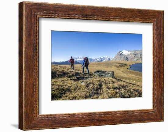 Hikers Wallking Along Rosset Lake, Gran Paradiso National Park, Alpi Graie (Graian Alps), Italy-Roberto Moiola-Framed Photographic Print