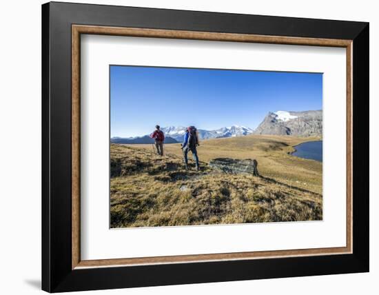 Hikers Wallking Along Rosset Lake, Gran Paradiso National Park, Alpi Graie (Graian Alps), Italy-Roberto Moiola-Framed Photographic Print