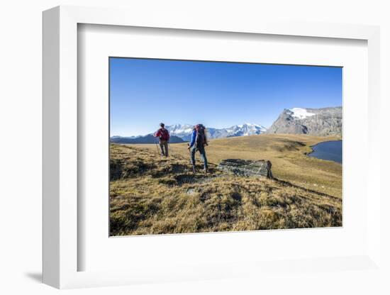 Hikers Wallking Along Rosset Lake, Gran Paradiso National Park, Alpi Graie (Graian Alps), Italy-Roberto Moiola-Framed Photographic Print